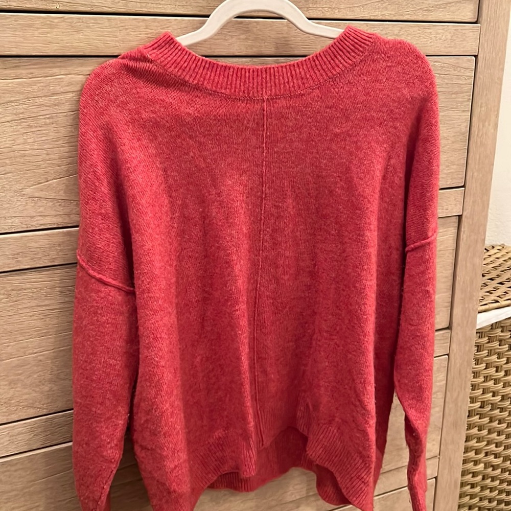 Orange/red target sweater